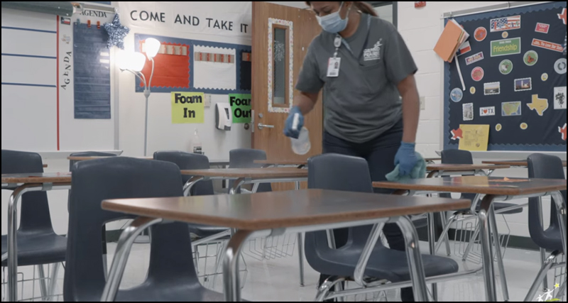 School Cleaner Disinfecting Classroom